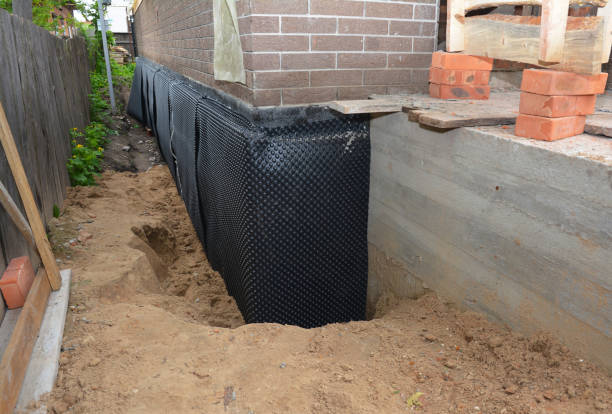 SJ Waterproofing Pros technician performing targeted Sump Pump Installation assessment in Newton, NC